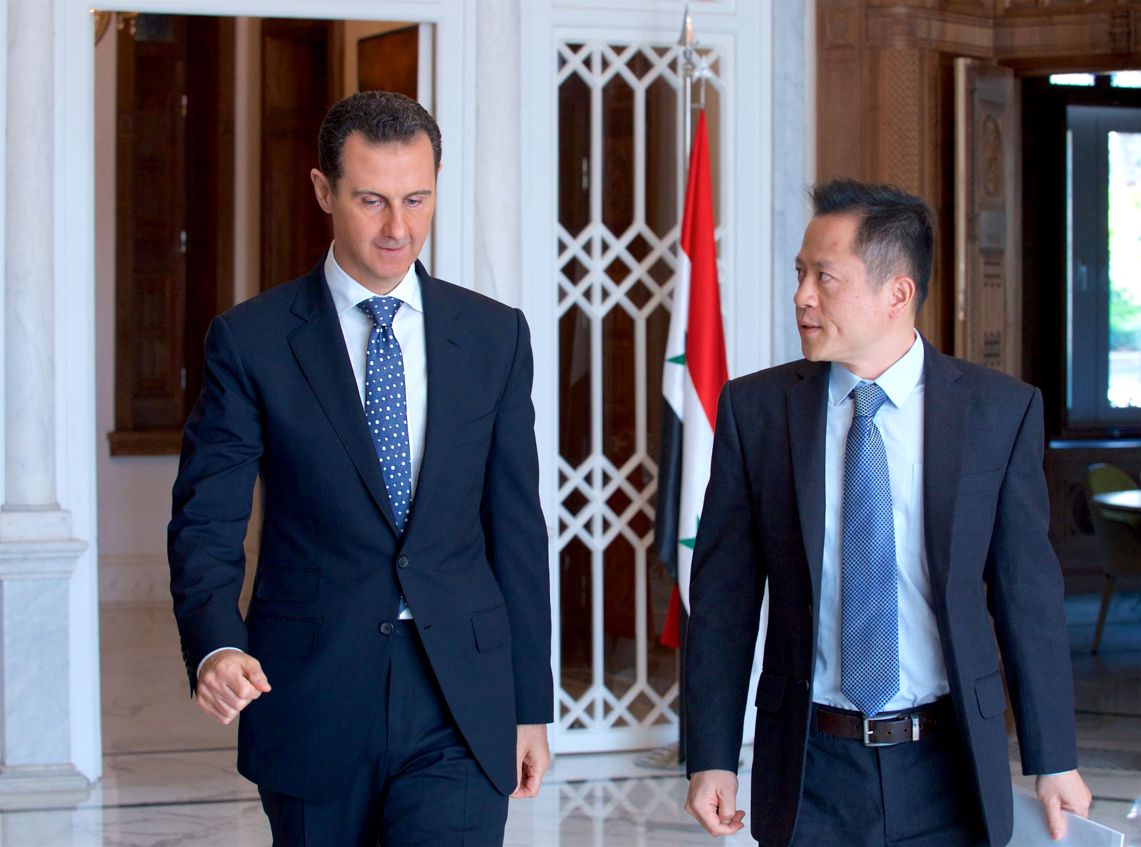 الأسد مع مراسل قناة 