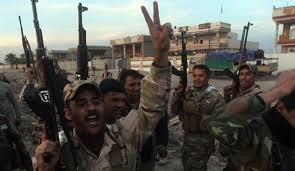 الجيش العراقي والحشد الشعبي: تقدم في معركة تحرير تكريت واستعادة السيطرة علي مناطق واسعة في صلاح الدين