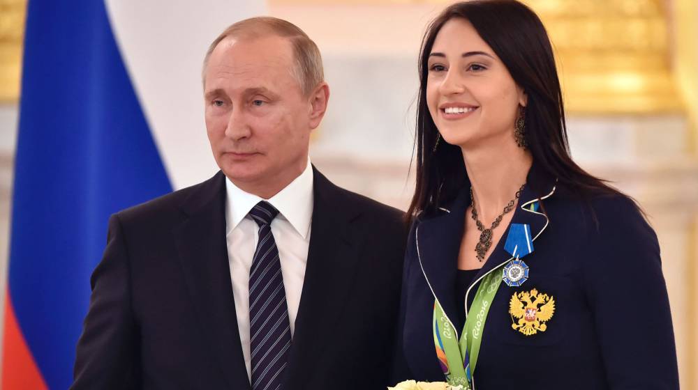 Putin regala un BMW a cada medallista ruso en Río
