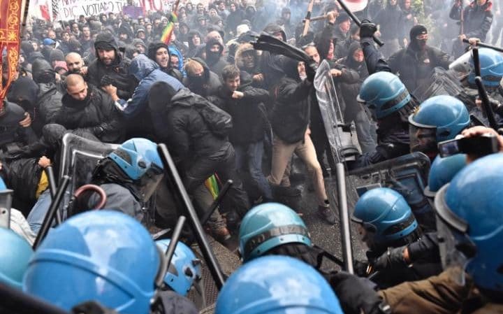 Italian Protestors Clash with Police at G7 Meeting Venue