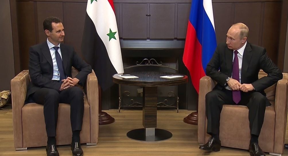 الرئيس الأسد يلتقي بوتين في روسيا وهذا ما دار بينهما
