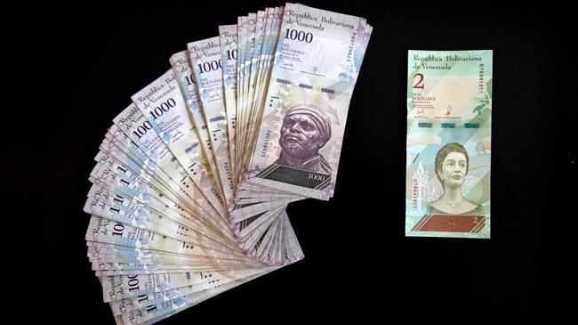 Venezuela Drops 5 Zeros from Currency Increases Wages by 30fold