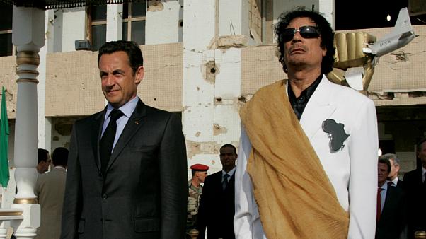 الرئيس الفرنسي السابق رهن التحقيق بتهمة "أعمال إجرامية" بسبب القذافي