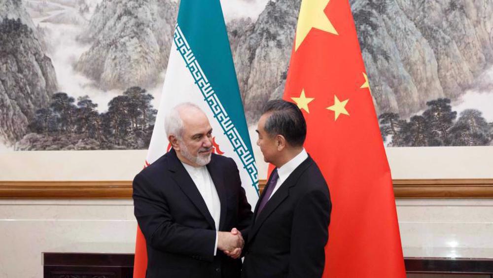 China Ready to Work with Iran against Unilateralism, Bullying Behavior: Top Diplomat