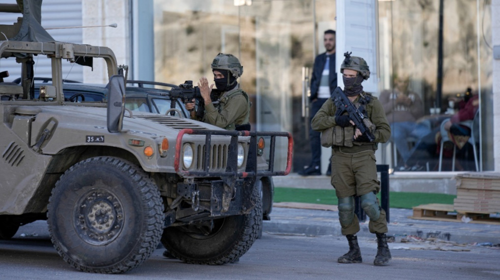 Israeli Regime Troops Raid Occupied West Bank Town, Injure Dozens of Palestinians