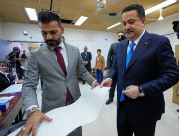 Iraqis Vote To Decide Political Future