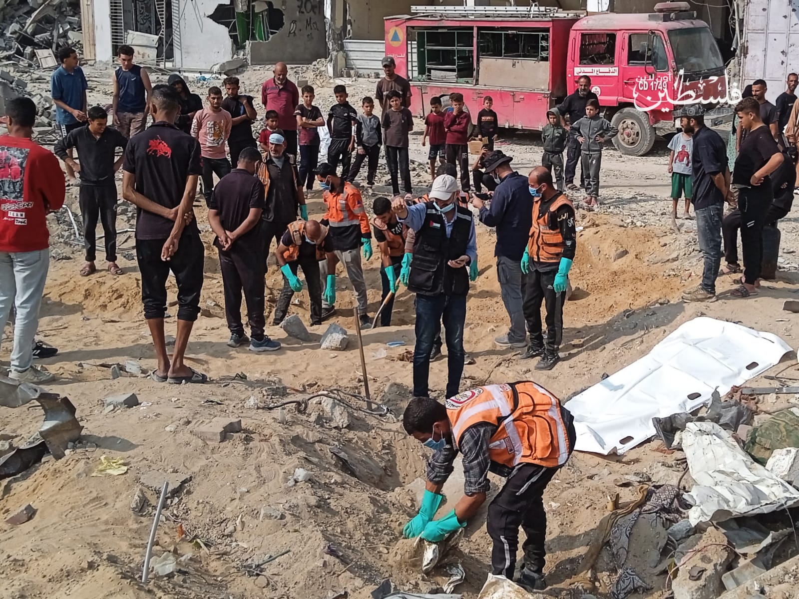 صحة غزة: دفن 14 شهيدًا احتجز الاحتلال جثامينهم بعد تعذّر التعرف عليهم