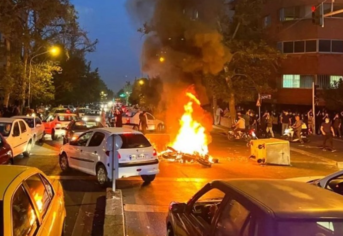 Rioters Damage Properties Including Public Infrastructure in Iran