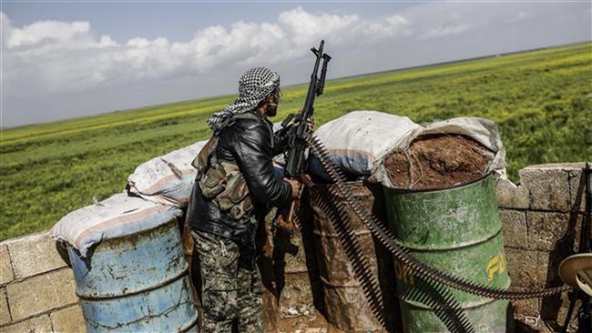 Syrian Kurdish Fighters Fight ISIS in Its Stronghold