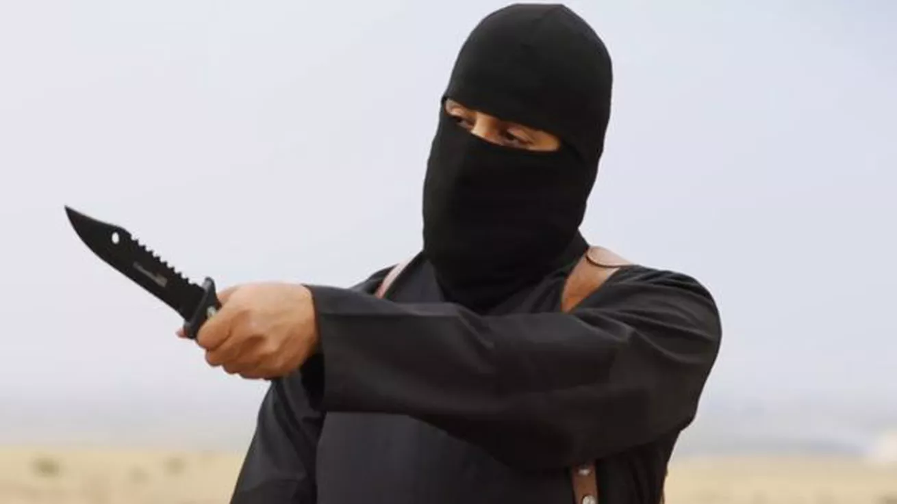 شاهدوا بالصورة ولأول مرة الوجه الحقيقي لـ "سفاح داعش"!